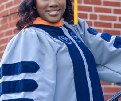 c-1758492178047-personal_1758492174124_1758492174124_drrhondasavain_rs-cap-and-gown-staircase