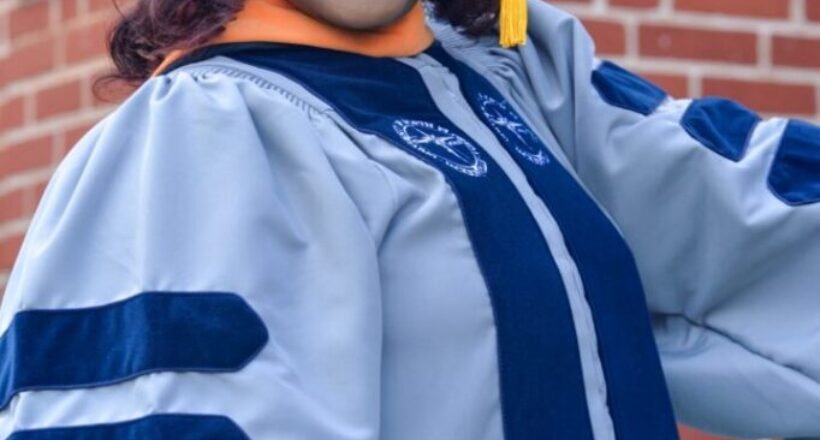 c-1758492178047-personal_1758492174124_1758492174124_drrhondasavain_rs-cap-and-gown-staircase